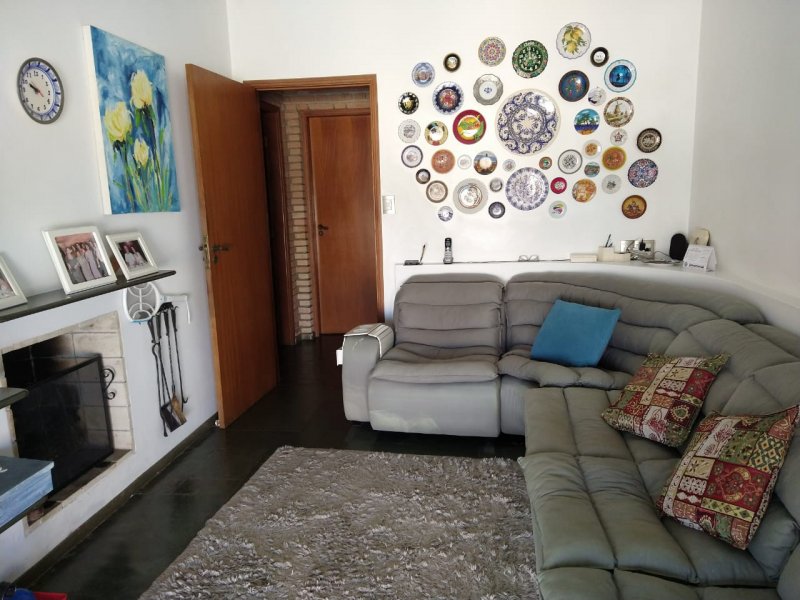 Casa de condomínio à venda Loteamento Eldorado com 450m² e 4 quartos por R$ 2.100.000 - 1621100089-sala-tv-1.jpeg