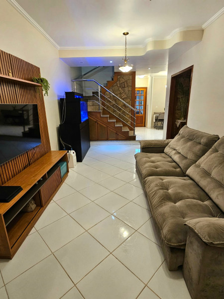 Casa de condomínio à venda Jardim Independência com 235m² e 3 quartos por R$ 1.200.000 - 1681679876-sala-de-estar-02.jpeg