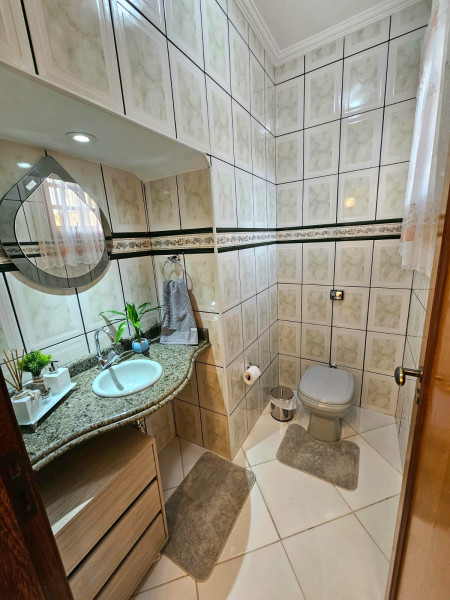 Casa de condomínio à venda Jardim Independência com 235m² e 3 quartos por R$ 1.200.000 - 2024949488-lavabo.jpeg