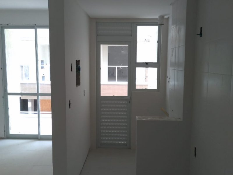 Apartamento para alugar Campeche com 73m² e 2 quartos por R$ 605.000 - 1191541752-lavanderia-de-semelhante.jpg