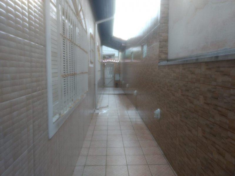Casa à venda Jardim Suarão - Praia com 250m² e 3 quartos por R$ 320.000 - 1348394272-casa-itanhaem-quintal-lateral-esquerda1.jpg
