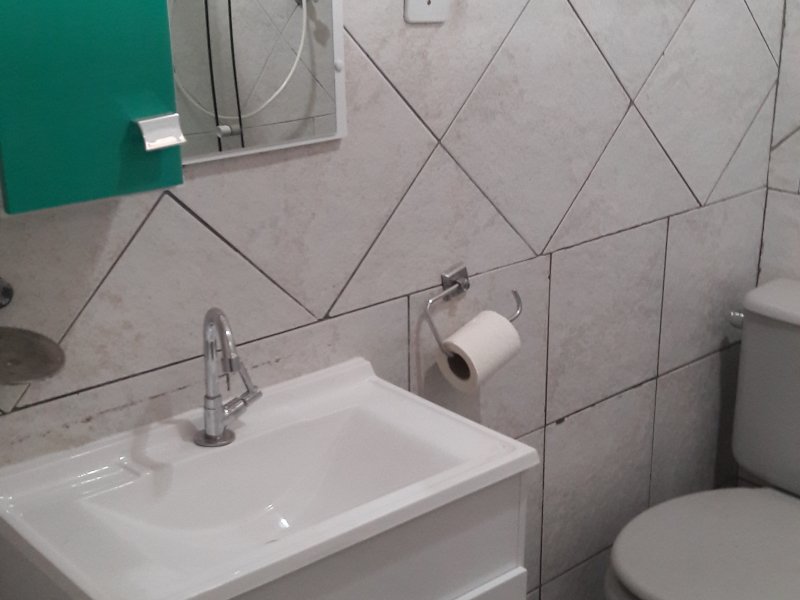 Kitnet à venda Liberdade com 29m² e 1 quarto por R$ 150.000 - 566473995-armario-banheiro.jpg