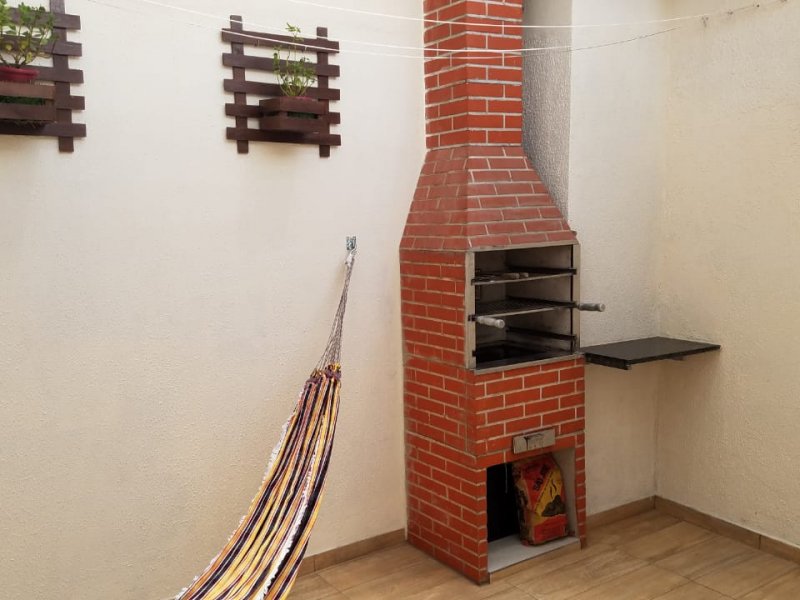 Casa de condomínio à venda Jardim Celia com 70m² e 2 quartos por R$ 350.000 - 1382859177-quintal-rede-e-churrasqueira.jpeg
