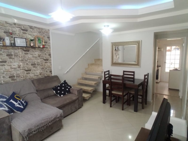 Casa de condomínio à venda Jardim Celia com 70m² e 2 quartos por R$ 350.000 - 2022492045-sala-visao-da-janela.jpeg