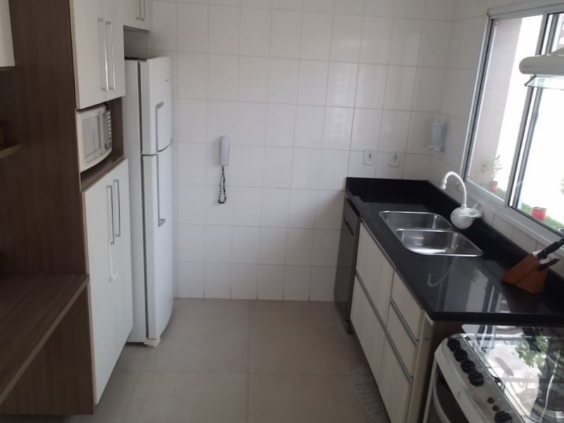 Casa de condomínio à venda Jardim Celia com 70m² e 2 quartos por R$ 350.000 - 404523166-cozinha-visao-geral.jpeg