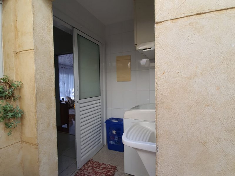 Casa de condomínio à venda Jardim Passargada I com 173m² e 3 quartos por R$ 1.500.000 - 1260986616-28-area-de-servico.jpeg