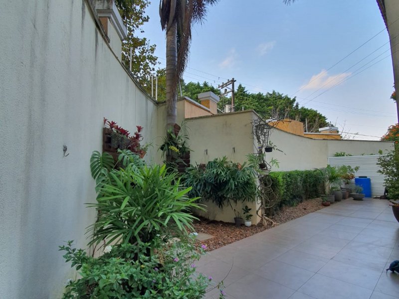 Casa de condomínio à venda Jardim Passargada I com 173m² e 3 quartos por R$ 1.500.000 - 1600390021-31-quintal.jpeg