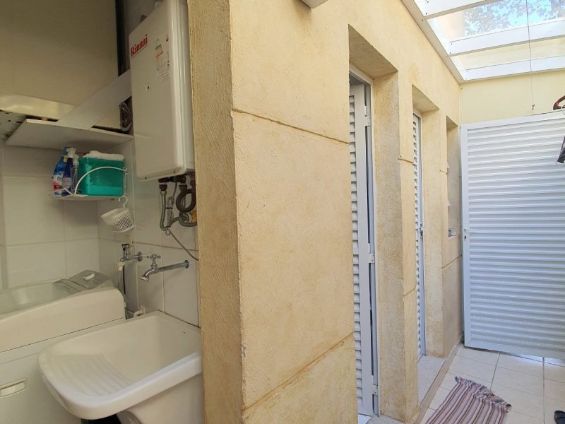 Casa de condomínio à venda Jardim Passargada I com 173m² e 3 quartos por R$ 1.500.000 - 409928432-29-area-de-servico-banho-e-dependencia.jpeg