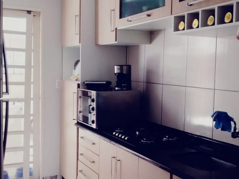Casa de condomínio à venda Ronda com 60m² e 2 quartos por R$ 150.000 - 1272096886-cozinha-com-planejados-e-cooktop.jpg