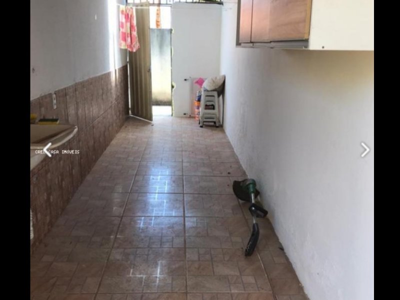 Casa de condomínio à venda Dom Pedro I com 62m² e 2 quartos por R$ 155.000 - 684362091-area-de-servico.jpg