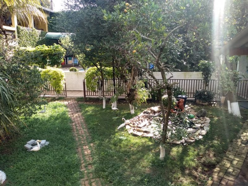 Casa à venda Jardim Esperança com 559m² e 3 quartos por R$ 1.200.000 - 1245249-quintal-olhando-da-varanda.jpeg