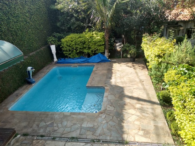 Casa à venda Jardim Esperança com 559m² e 3 quartos por R$ 1.200.000 - 1866397588-olhando-para-a-piscina.jpeg