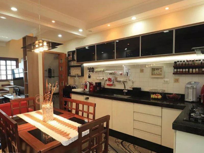 Casa à venda Vila Scarpelli com 122m² e 2 quartos por R$ 500.000 - 1953398661-area-social-1.jpg