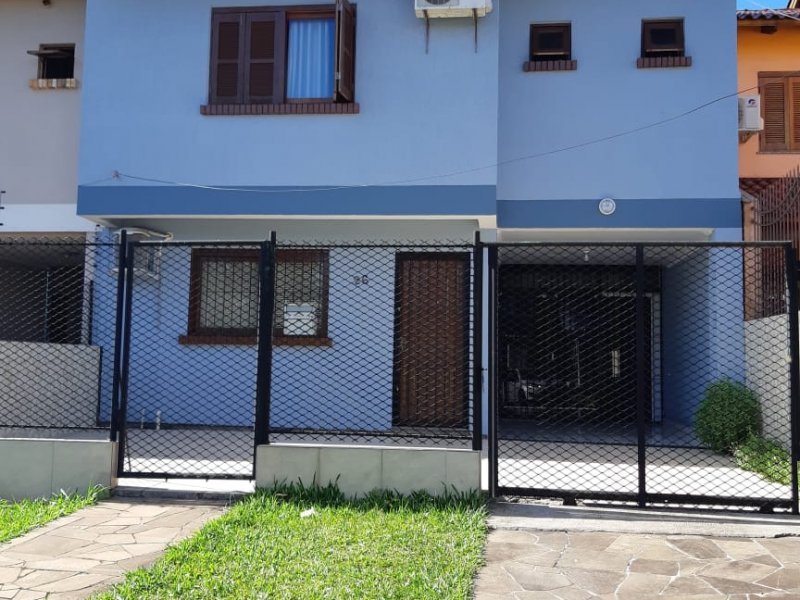 Casa à venda Rubem Berta com 150m² e 3 quartos por R$ 427.000 - 1804826870-frente-casa-1.jpg