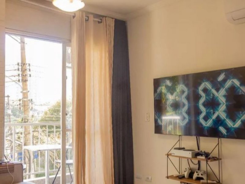 Apartamento à venda Santo Amaro com 51m² e 2 quartos por R$ 425.000 - 324523527-sala1.JPG