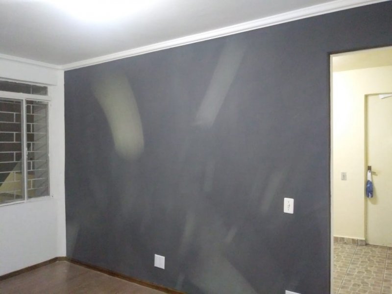 Apartamento à venda Campo Comprido com 40m² e 2 quartos por R$ 135.000 - 846551860-parede-sala.jpeg