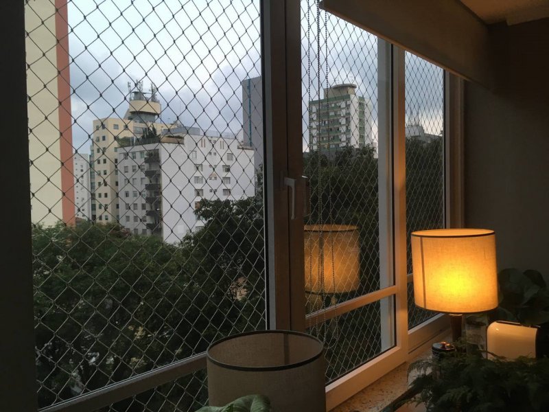 Apartamento à venda Jardim Paulista com 108m² e 2 quartos por R$ 1.390.000 - 856252878-a10-sala-vista-fim-de-tarde-5259.jpg