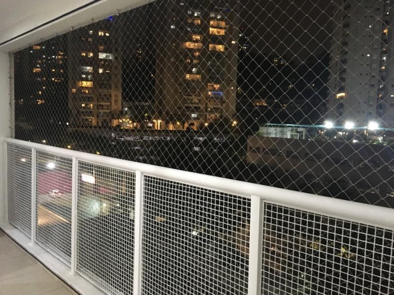 Apartamento à venda Vila Andrade com 67m² e 2 quartos por R$ 490.000 - 1725989922-2-foto-sacada-noite.jpeg