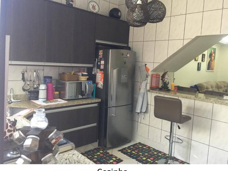 Casa à venda Vila Caminho do Mar com 120m² e 3 quartos por R$ 535.000 - 672917028-vista-da-cozinha-pela-porta-do-quintal.jpeg