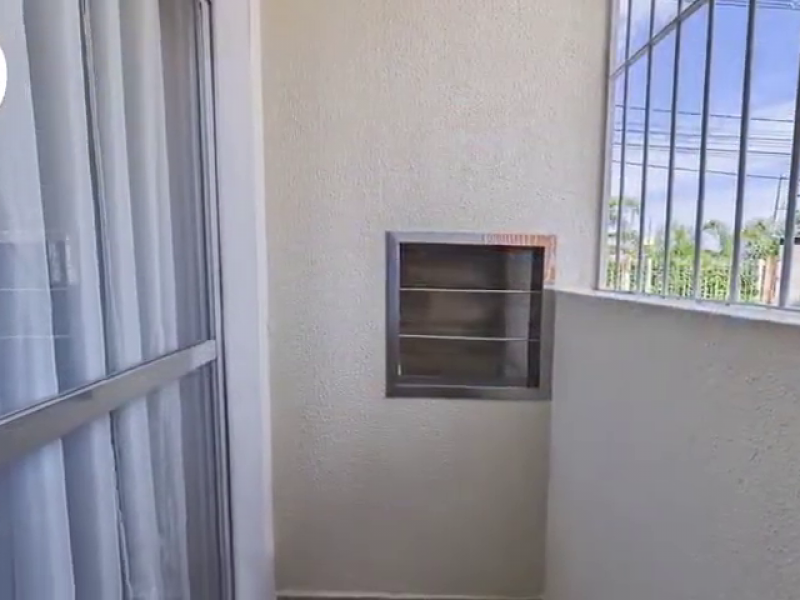 Apartamento à venda Centro com 47m² e 2 quartos por R$ 260.000 - 1870660776-varanda-churrasqueira.png