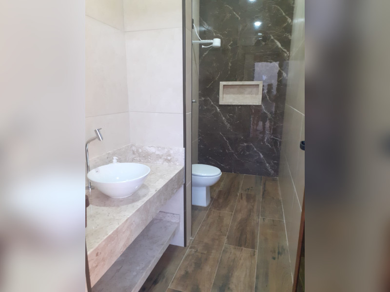 Casa de condomínio à venda centro com 267m² e 3 quartos por R$ 980.000 - 23-wc-area-churrasq.jpg