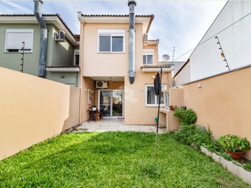 Casa à venda Guarujá com 176m² e 3 quartos por R$ 460.000 - 25742167-patio-fundos.jpeg