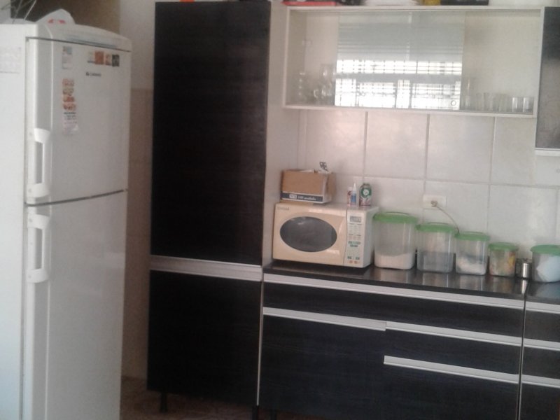 Casa à venda Praia das Palmeiras com 194m² e 2 quartos por R$ 390.000 - 2142523958-cozinhainterna.jpg