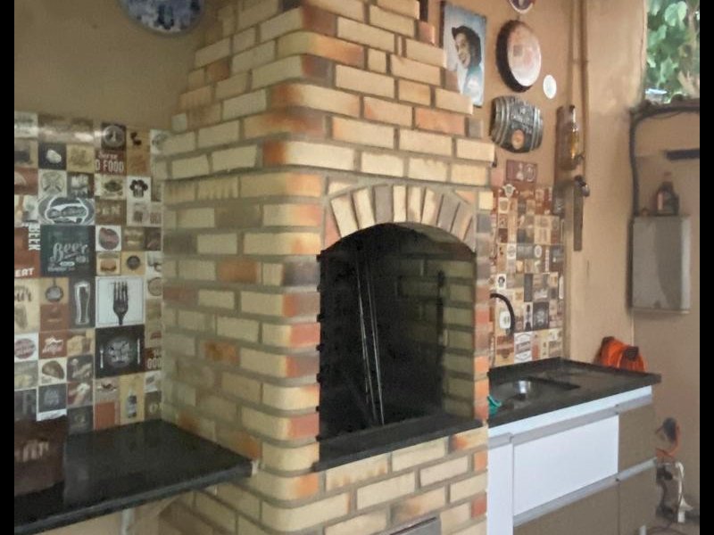 Casa à venda Canto do Forte com 131m² e 3 quartos por R$ 690.000 - 1140102878-anyconv.jpg