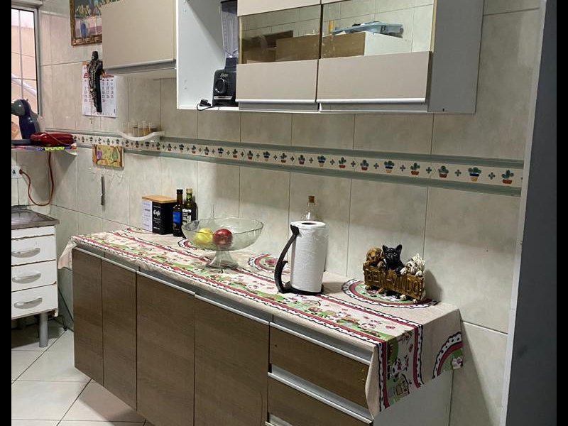 Casa à venda Canto do Forte com 131m² e 3 quartos por R$ 690.000 - 826855711-anyconv.jpg