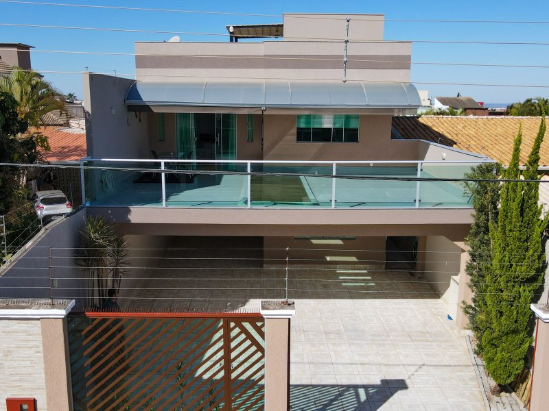 Casa de condomínio à venda Centro com 468m² e 4 quartos por R$ 1.960.000 - 2019884922-frente-casa.jpg