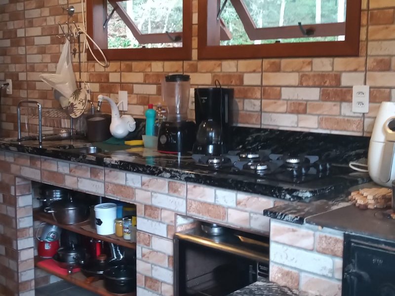 Sítio à venda Centro com 20000m² e 1 quarto por R$ 1.770.000 - 993523063-cozinha-fogao-lenha.jpg