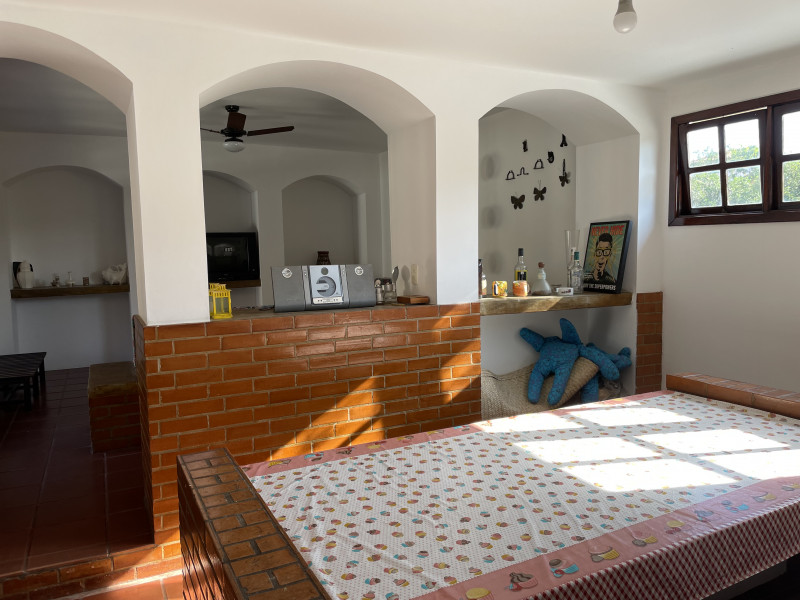 Casa à venda Itaúna com 297m² e 5 quartos por R$ 750.000 - 1109366271-25-sala-jantar-e-fundos-sala-estar.jpg