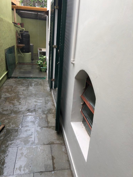 Casa à venda Vila Madalena com 182m² e 3 quartos por R$ 1.550.000 - 1811415784-lateral-casa-apos-porta-principal-2.jpg