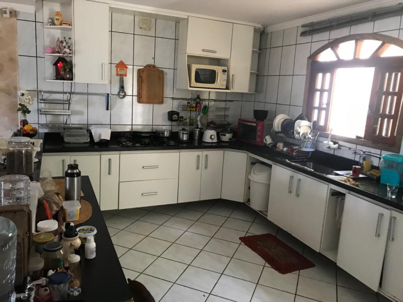 Casa de condomínio à venda Centro com 376m² e 4 quartos por R$ 692.000 - 1157808592-cozinha.jpeg