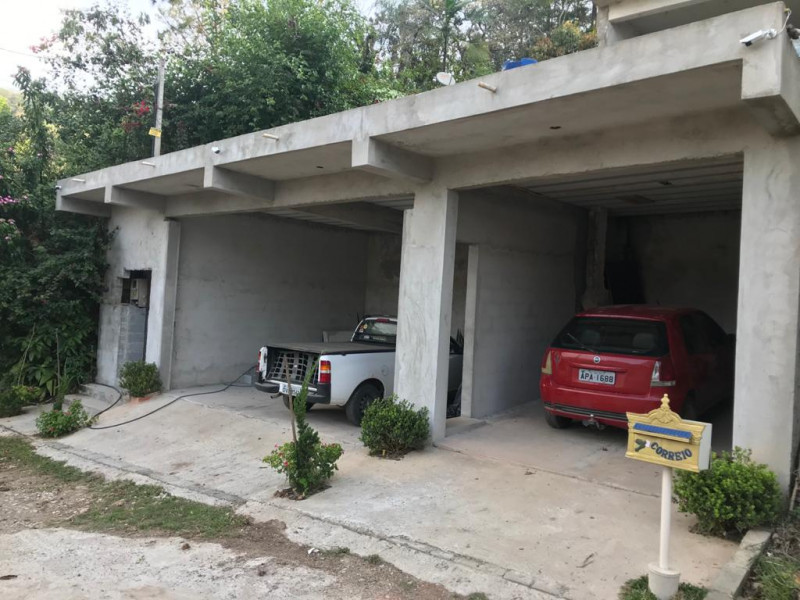 Casa de condomínio à venda Centro com 376m² e 4 quartos por R$ 692.000 - 1735880792-garagem.jpeg