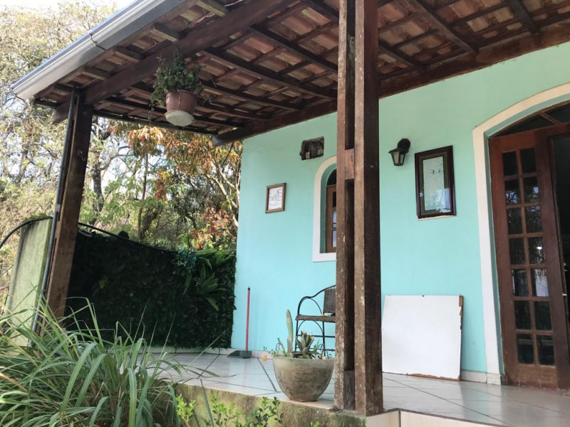 Casa de condomínio à venda Centro com 376m² e 4 quartos por R$ 692.000 - 1913130147-varanda-terrea-1.jpeg