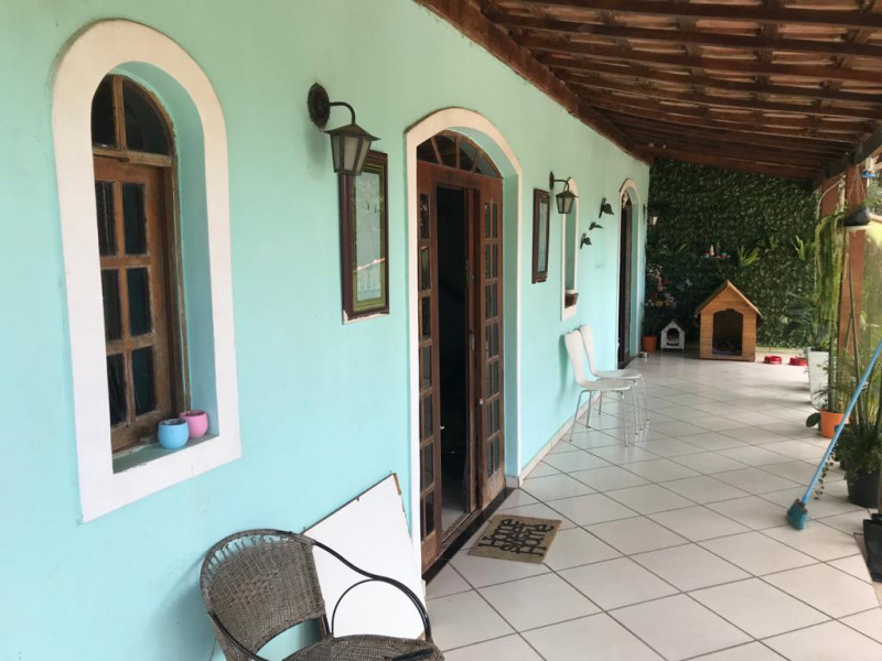 Casa de condomínio à venda Centro com 376m² e 4 quartos por R$ 692.000 - 342935199-varandda-lado-direito-terrea.jpeg
