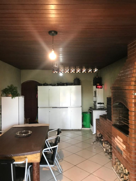 Casa de condomínio à venda Centro com 376m² e 4 quartos por R$ 692.000 - 534124800-cozinha-caipira.jpeg