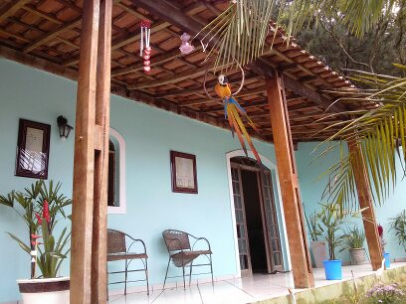 Casa de condomínio à venda Centro com 376m² e 4 quartos por R$ 692.000 - 570988643-varanda-terrea.jpg
