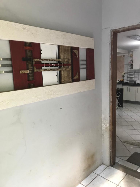 Casa de condomínio à venda Centro com 376m² e 4 quartos por R$ 692.000 - 743232688-hall-de-entrada.jpeg