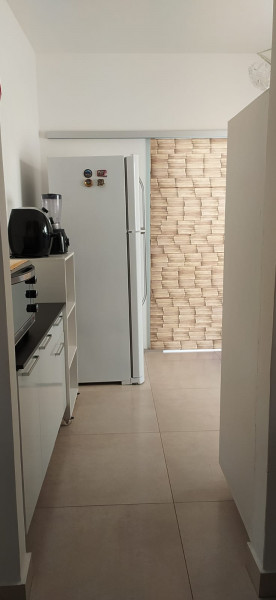 Casa à venda Planalto com 170m² e 3 quartos por R$ 415.000 - 2003366179-foto-lateral-passagem-para-cozinha.jpg