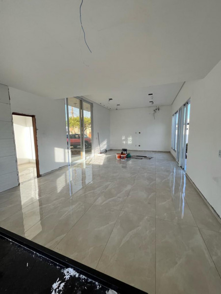 Casa de condomínio à venda Centro com 239m² e 3 quartos por R$ 1.100.000 - 1167001989-cozinha-e-sala.jpeg