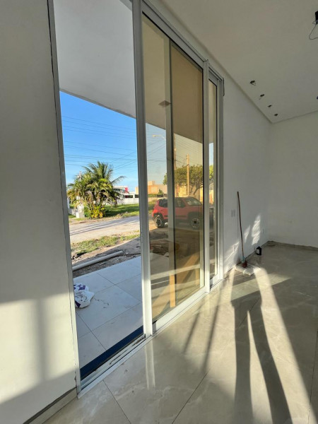 Casa de condomínio à venda Centro com 239m² e 3 quartos por R$ 1.100.000 - 1421782656-entrada-principal.jpeg