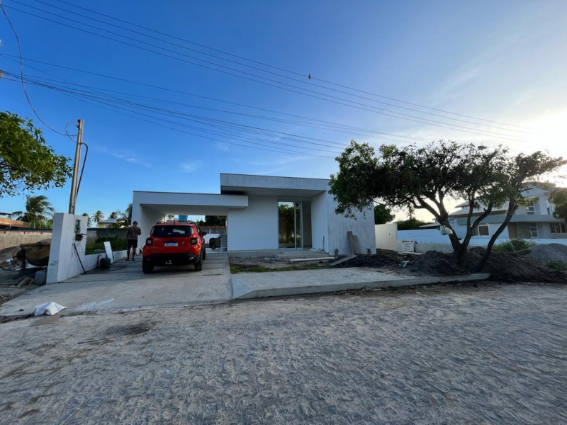 Casa de condomínio à venda Centro com 239m² e 3 quartos por R$ 1.100.000 - 1546124010-frente-casa.jpeg