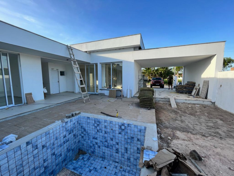 Casa de condomínio à venda Centro com 239m² e 3 quartos por R$ 1.100.000 - 2054734292-frente-sala.jpeg