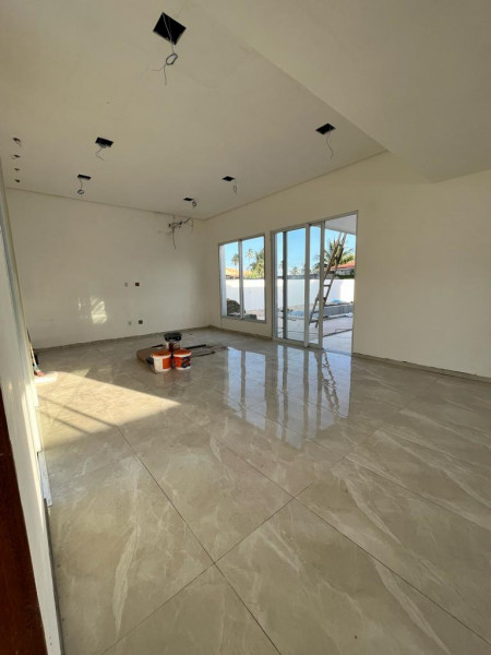 Casa de condomínio à venda Centro com 239m² e 3 quartos por R$ 1.100.000 - 870870288-saida-sala.jpeg