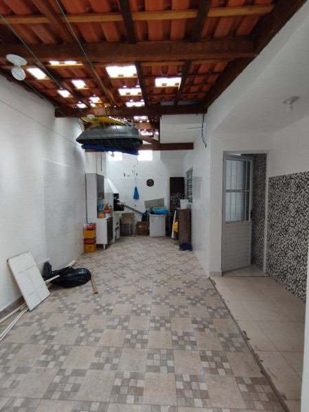 Casa à venda Aguassai com 70m² e 3 quartos por R$ 375.000 - 142053779-foto-fundo-area-churrasqueira-e-lavanderia.jpg