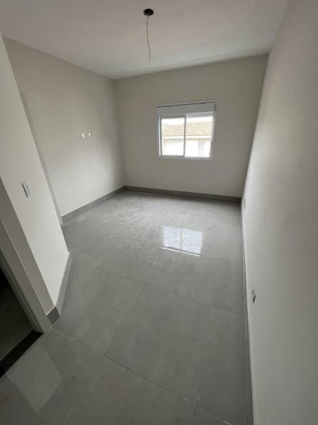 Casa de condomínio à venda Cibratel II com 165m² e 3 quartos por R$ 610.000 - 1013227455-suite-1.jpg