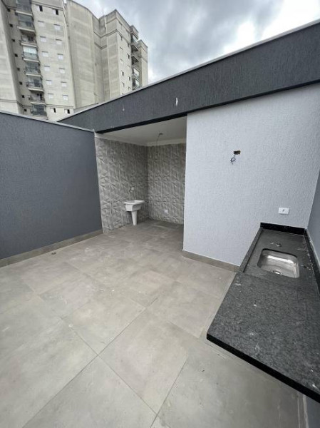 Casa de condomínio à venda Cibratel II com 165m² e 3 quartos por R$ 610.000 - 1469585381-terraco-gourmet.jpg