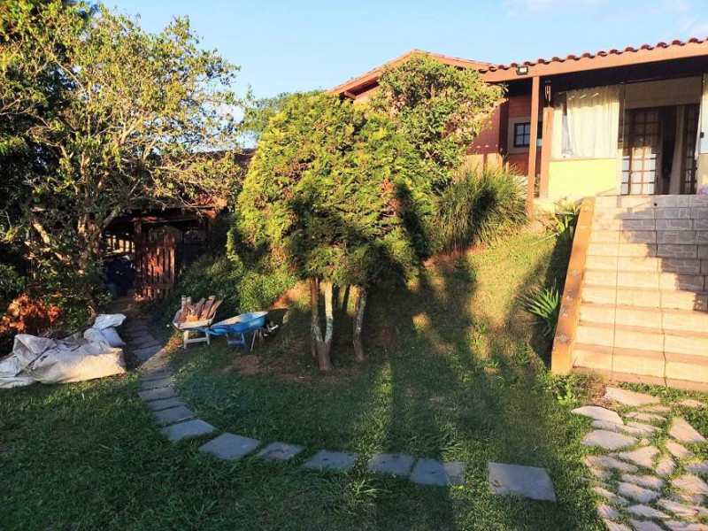 Casa de condomínio à venda Centro com 1000m² e 4 quartos por R$ 1.350.000 - 1265059536-foto-casa-fundos-2.jpg